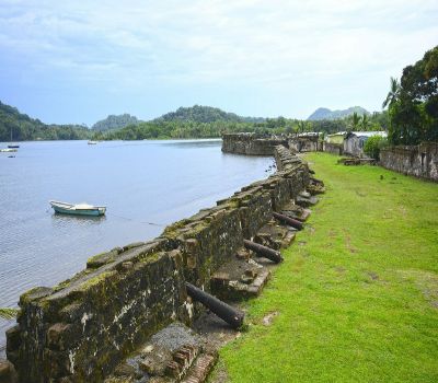 Colon is the capital of Colon Province, in Panama. It sits on the Caribbean coast, at the entrance to the Panama Canal. The Canal Expansion Observation Center is a park with viewing platforms over the canal’s Atlantic locks and Gatun Lake....