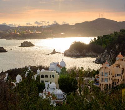 Santa María Huatulco is a town in the southern Mexican state of Oaxaca. It’s known for sprawling pre-Hispanic ruins in nearby Parque Eco-Arqueológico....