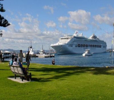 Tauranga is a harbourside city in the Bay of Plenty region on New Zealand's North Island. It hosts historic buildings like the Elms Mission Station....